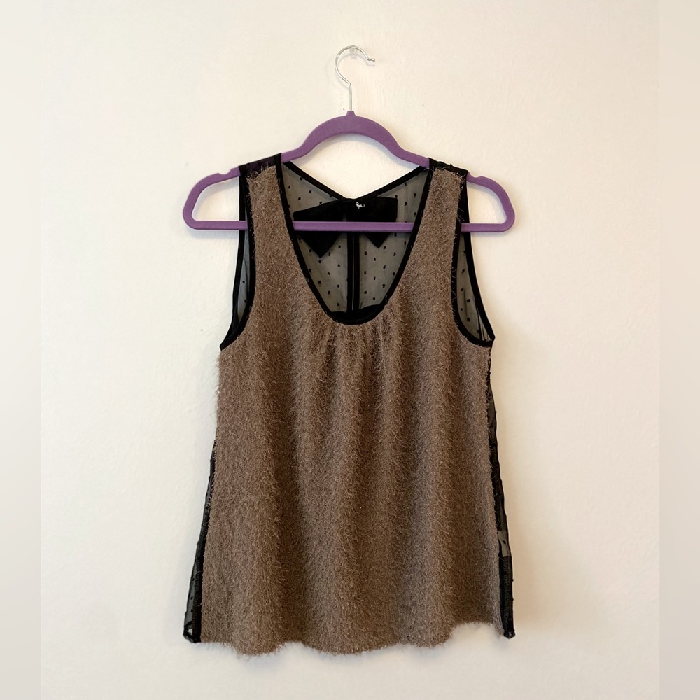 Ryu top with shimmery detail on the front and bows on the back.